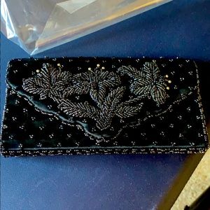 Black beaded w/blacks beads and faux pearls clutch
